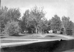 Irrigated lawn with flower bed, State Normal School campus