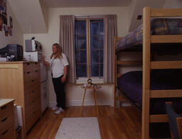 Female student in dorm room