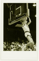 Action shot, University of Northern Colorado vs. Mesa State College basketball game, ca. 1990s.