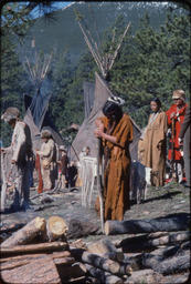 Actors in period costume near tipis, Estes Park, Colorado, 1978