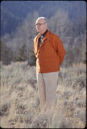 James Michener standing with arms behind back, Jackson Hole, Wyoming, 1977