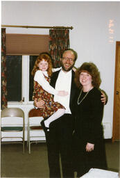Dan Frantz with a child and unidentified woman, November 12, 1994