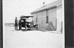 Sandy Davis and unidentified man with automobile, Dearfield, Colorado, ca. 1910s? 