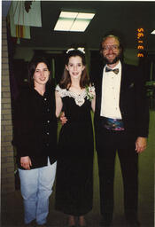 Dan Frantz with two unidentified females, March 31, 1995